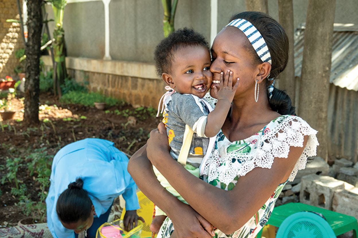 Image of a woman holding a child